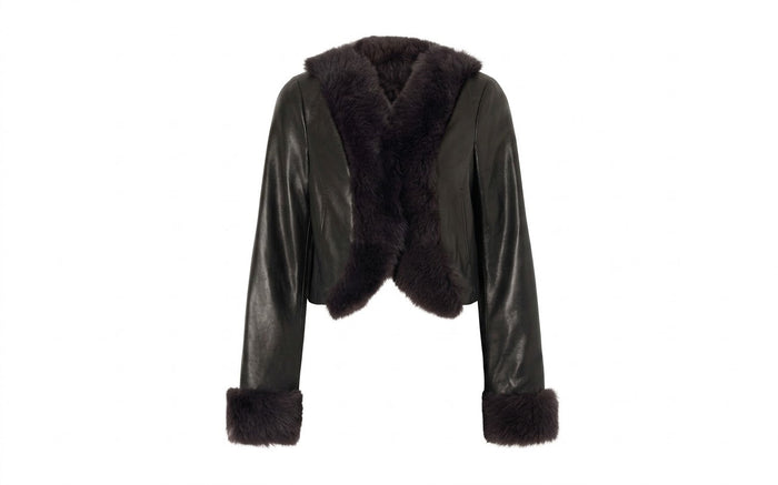 Women's cropped cowhide leather moto jacket with fur collar on white background