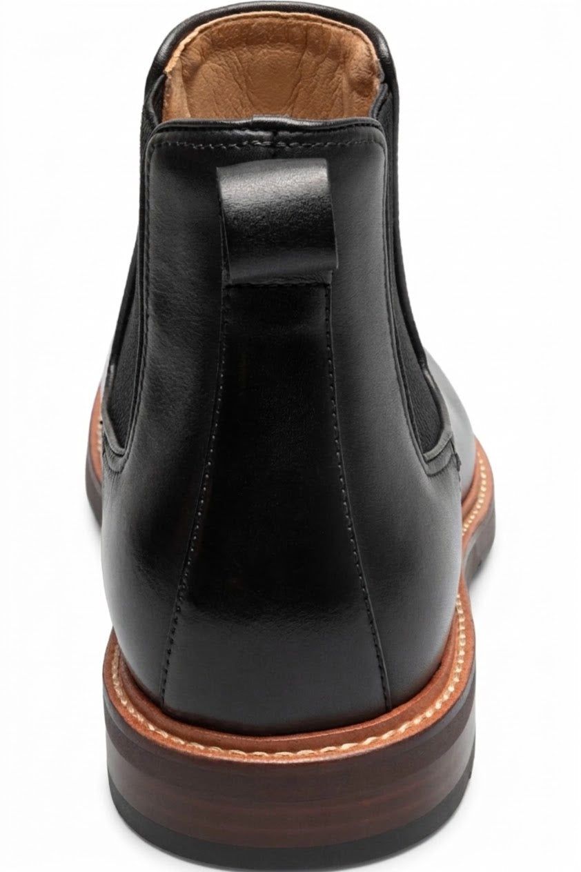 Back view of black Chelsea boot with pull tab