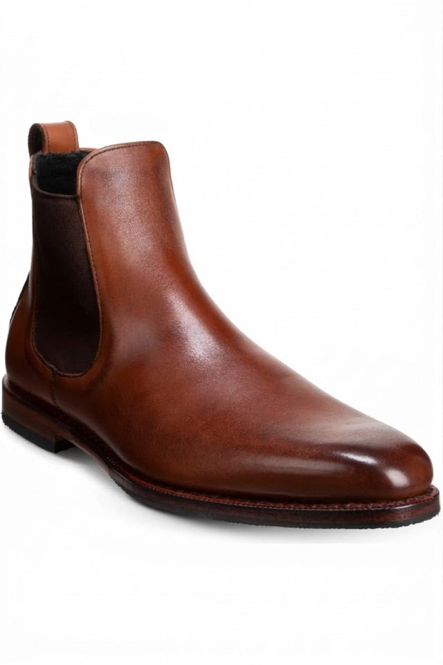 Men's dark brown leather Chelsea boots with elastic side panels