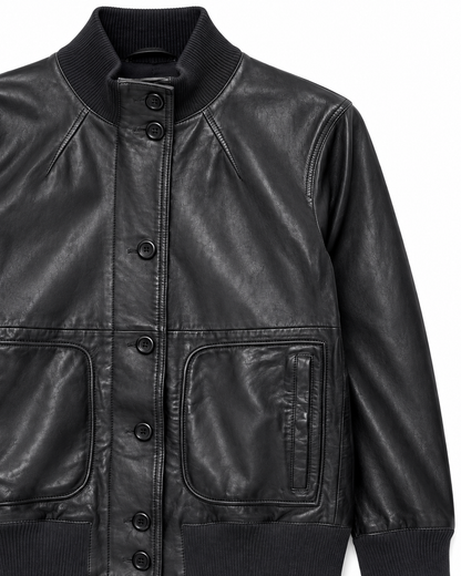 Women's black real leather bomber jacket buttoned up, showing patch pockets