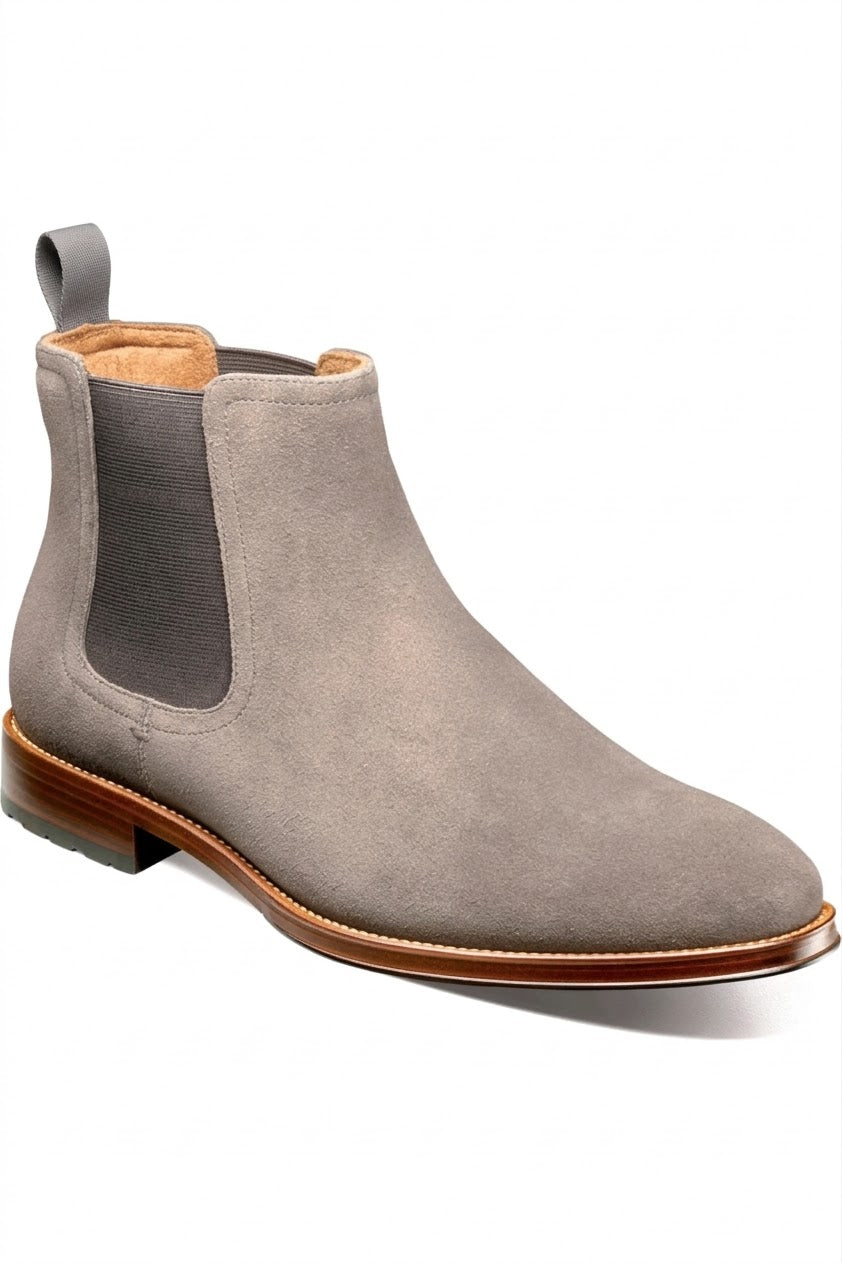 Men's grey suede Chelsea boot with tan sole, side view