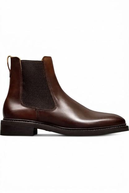 Side view of dark brown leather Chelsea boot with stacked heel
