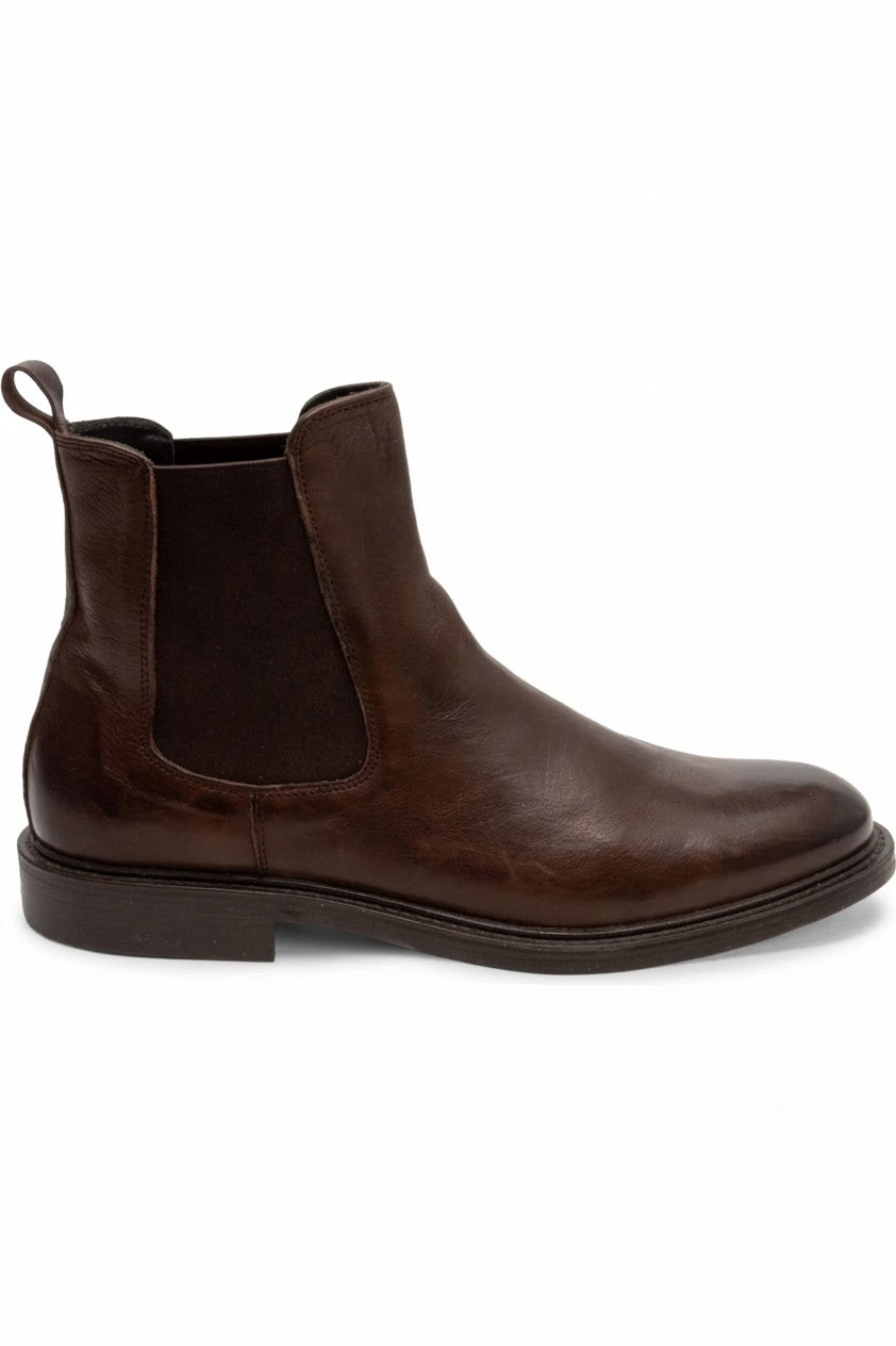 Side view of men's brown leather Chelsea boot