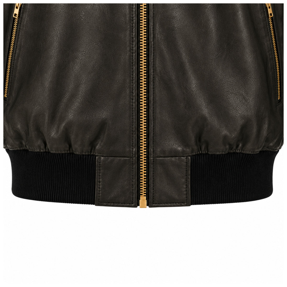 Close-up of gold zip pockets and ribbed waistband on black leather bomber