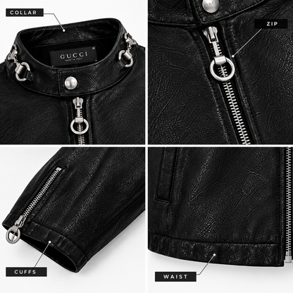 Close-up of collar, ring zip pull, cuff zip and waist on black moto jacket