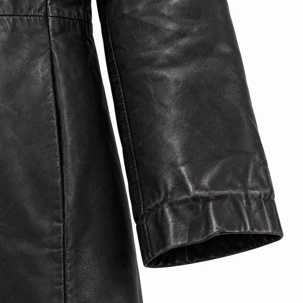 Close-up of sleeve cuff on women's black leather coat