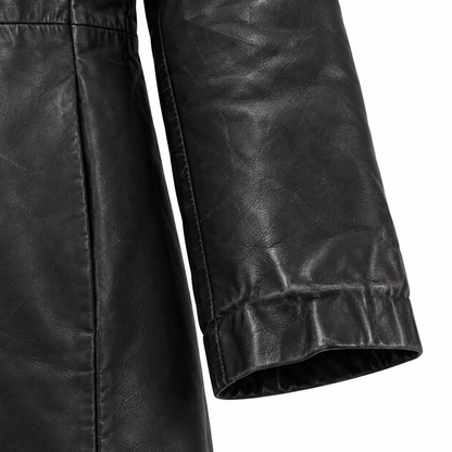 Close-up of sleeve cuff on women's black leather coat