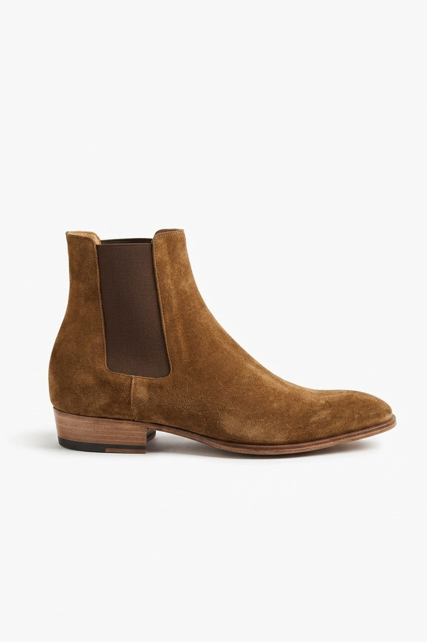 Side view of tan suede Chelsea boot with Cuban heel