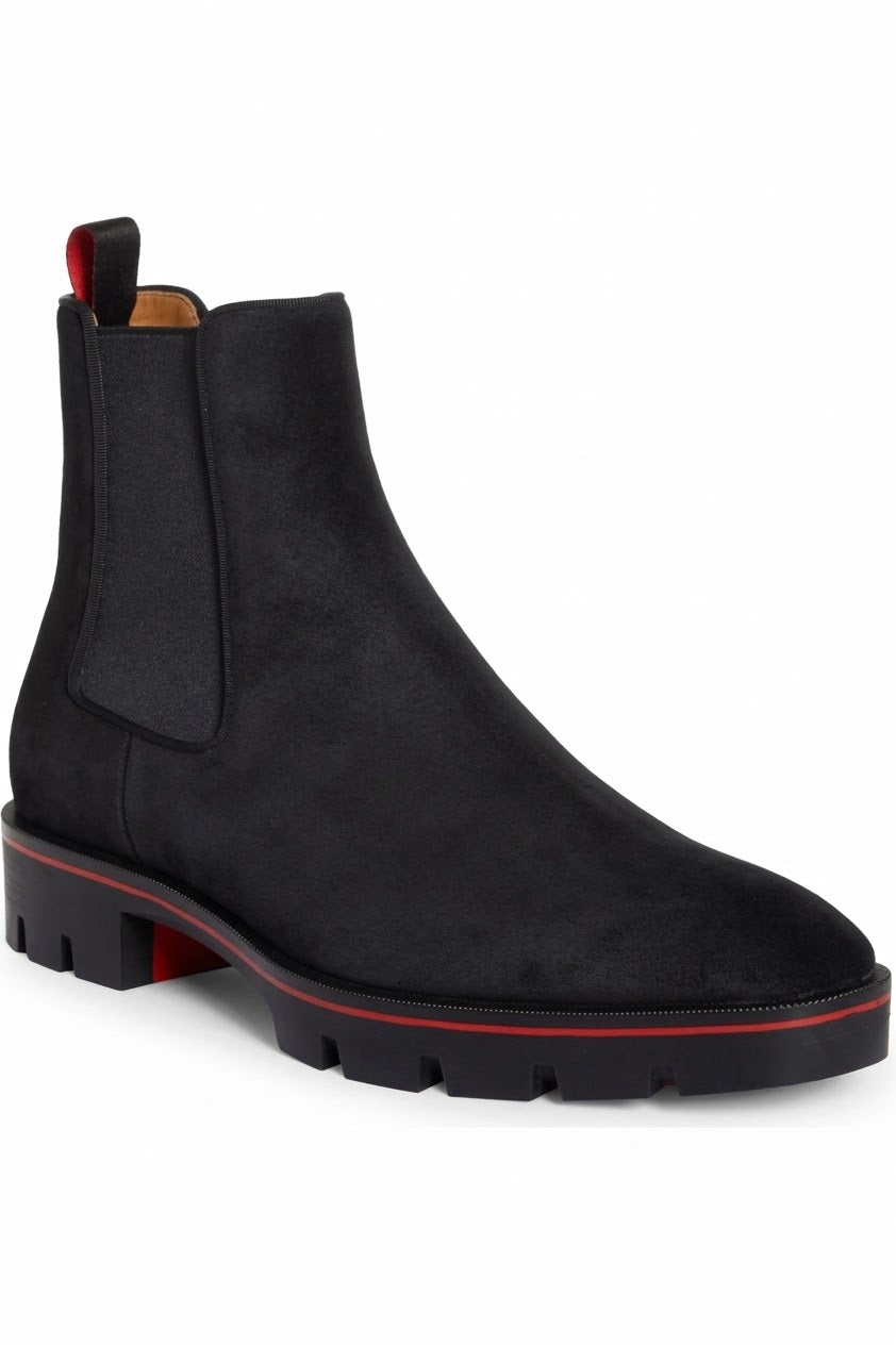 Black suede Chelsea boot with red sole edge, side view
