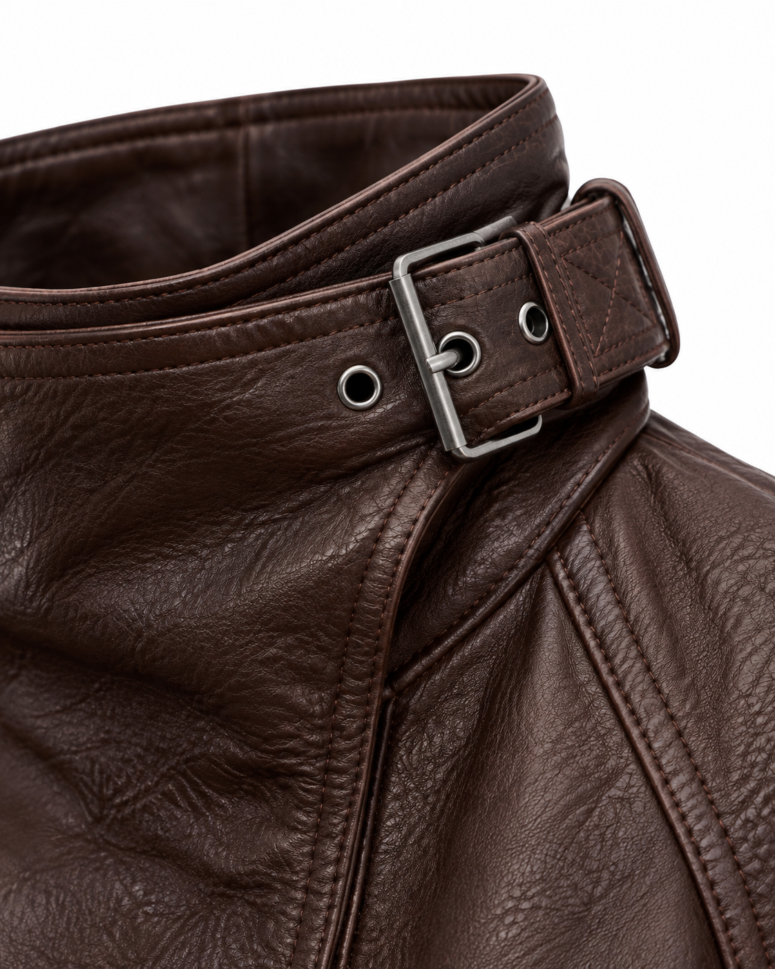 Detail of collar buckle hardware on oversized brown leather jacket