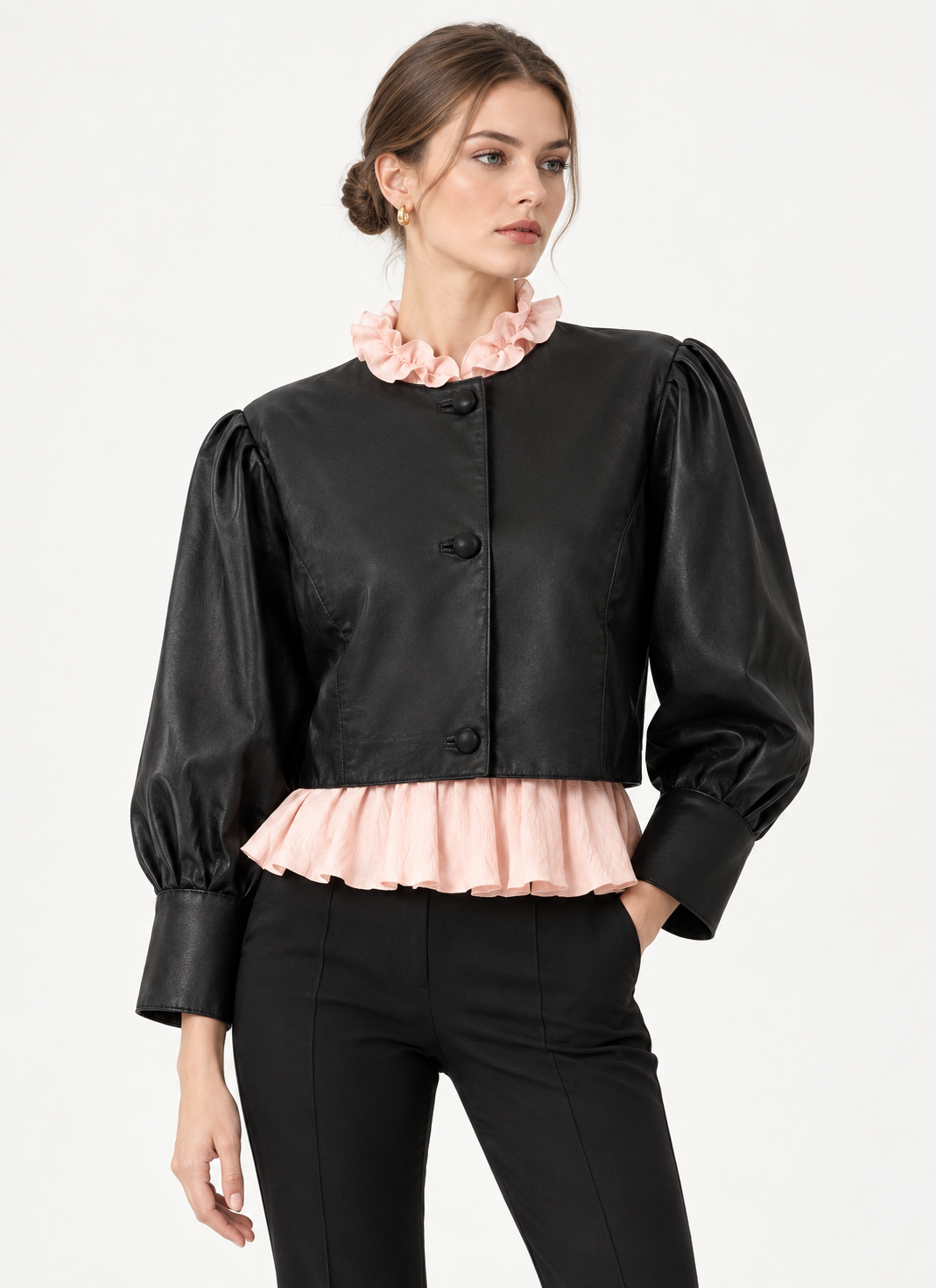Model wearing women's black cropped puff-sleeve leather jacket