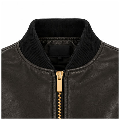 Close-up of ribbed collar and gold zip on black leather bomber jacket