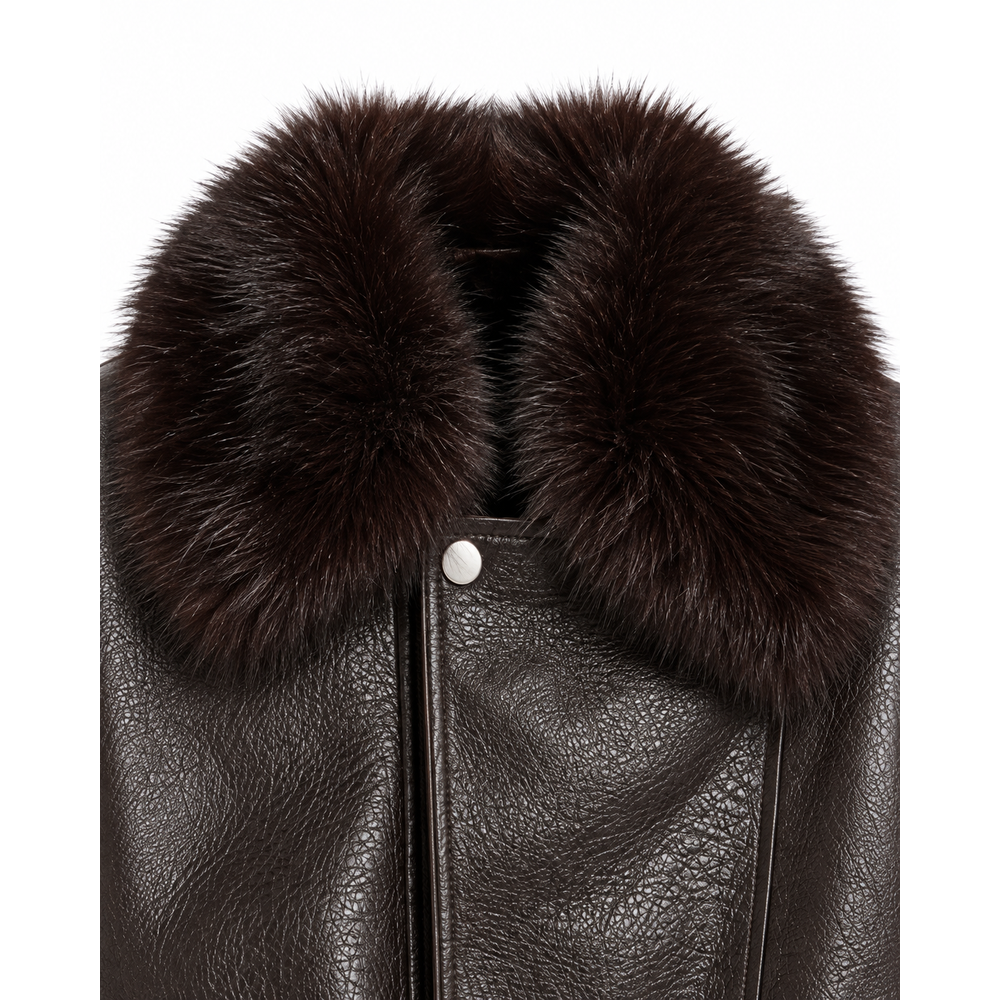 Close-up of oversized faux fur collar and snap button on brown leather jacket