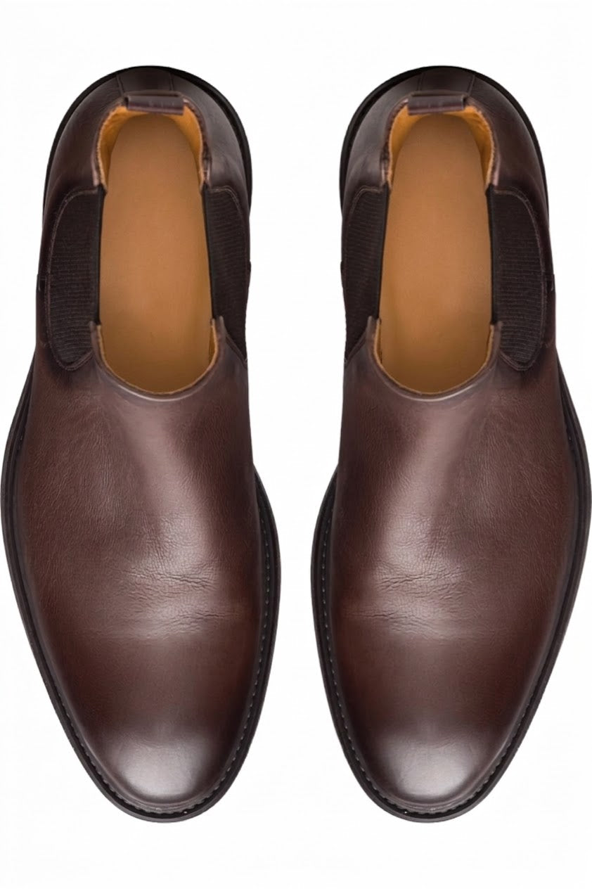Top view of pair of dark brown leather Chelsea boots