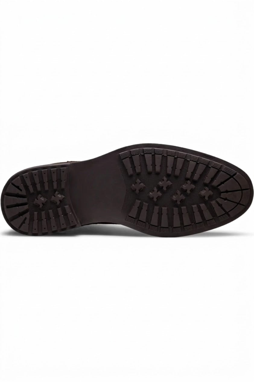 Commando lug outsole of men's brown Chelsea boot