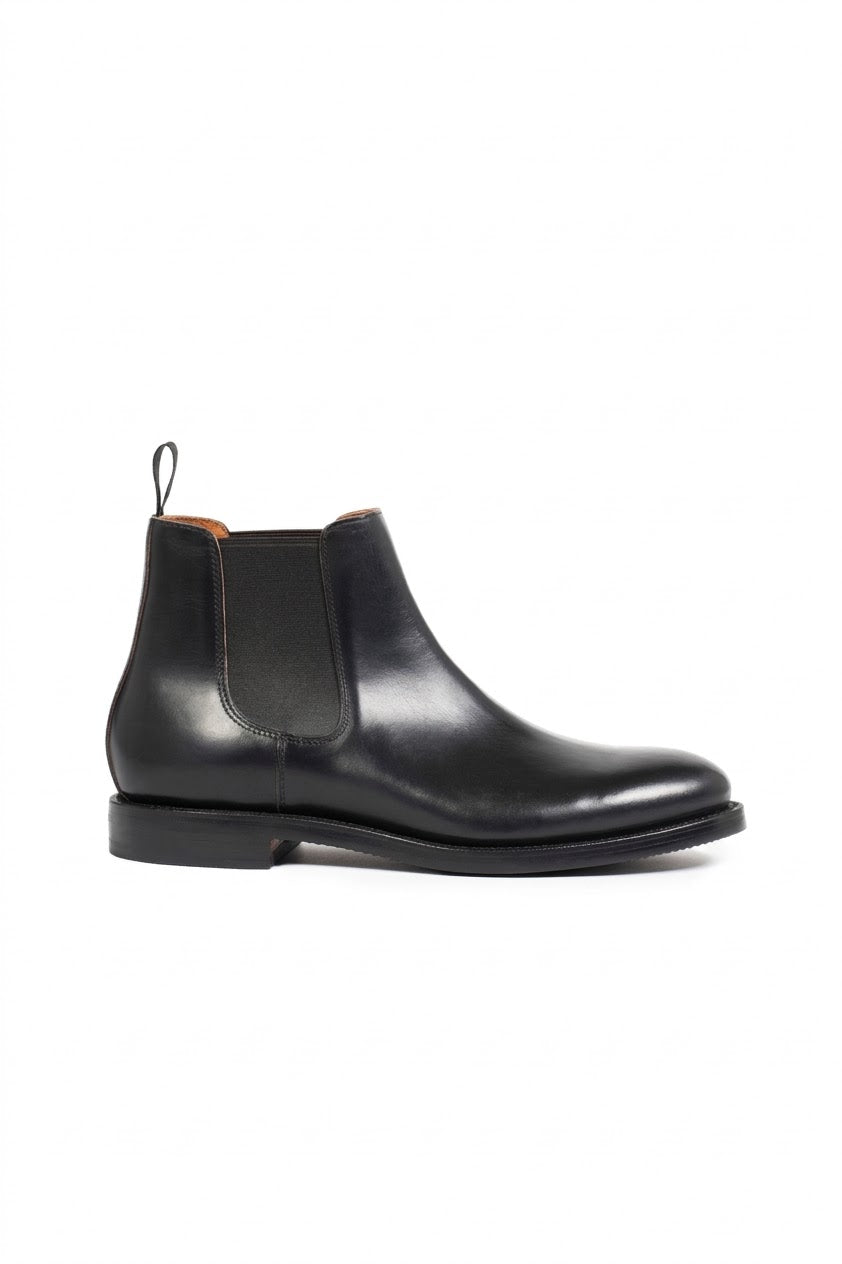 Men's black polished leather Chelsea boot, side view