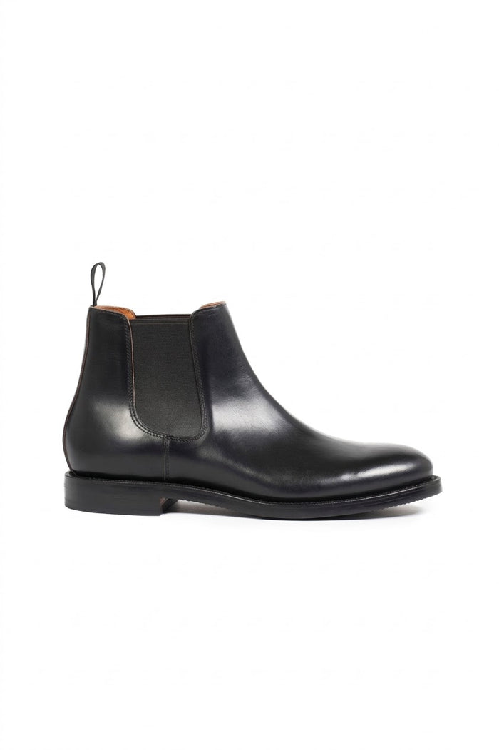 Men's black polished leather Chelsea boot, side view