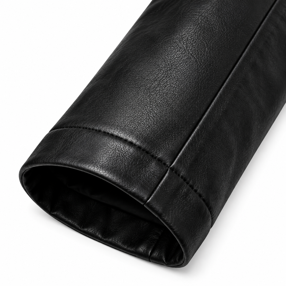 Close-up of sleeve and cuff on women's black leather biker jacket