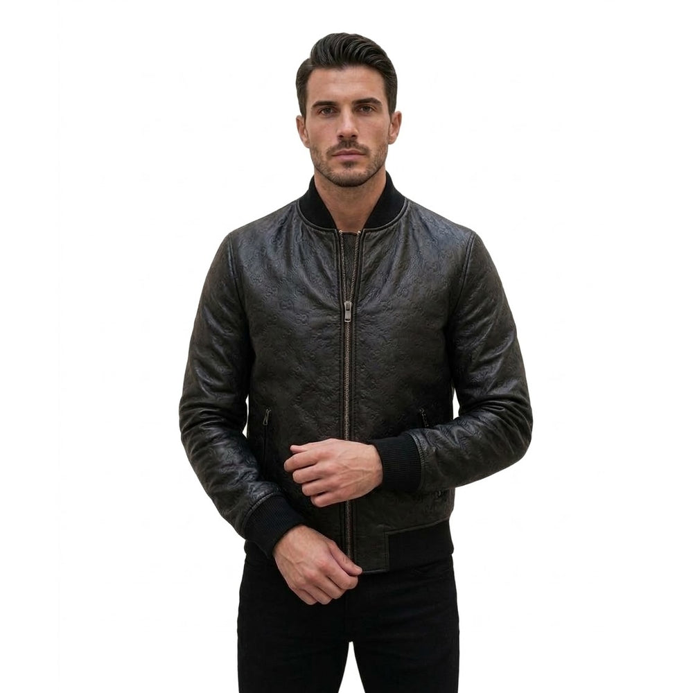 Man wearing a black embossed leather bomber jacket