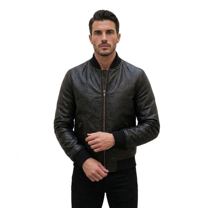Man wearing a black embossed leather bomber jacket