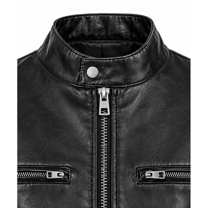 Close-up of front zip and zip chest pockets on women's black leather jacket
