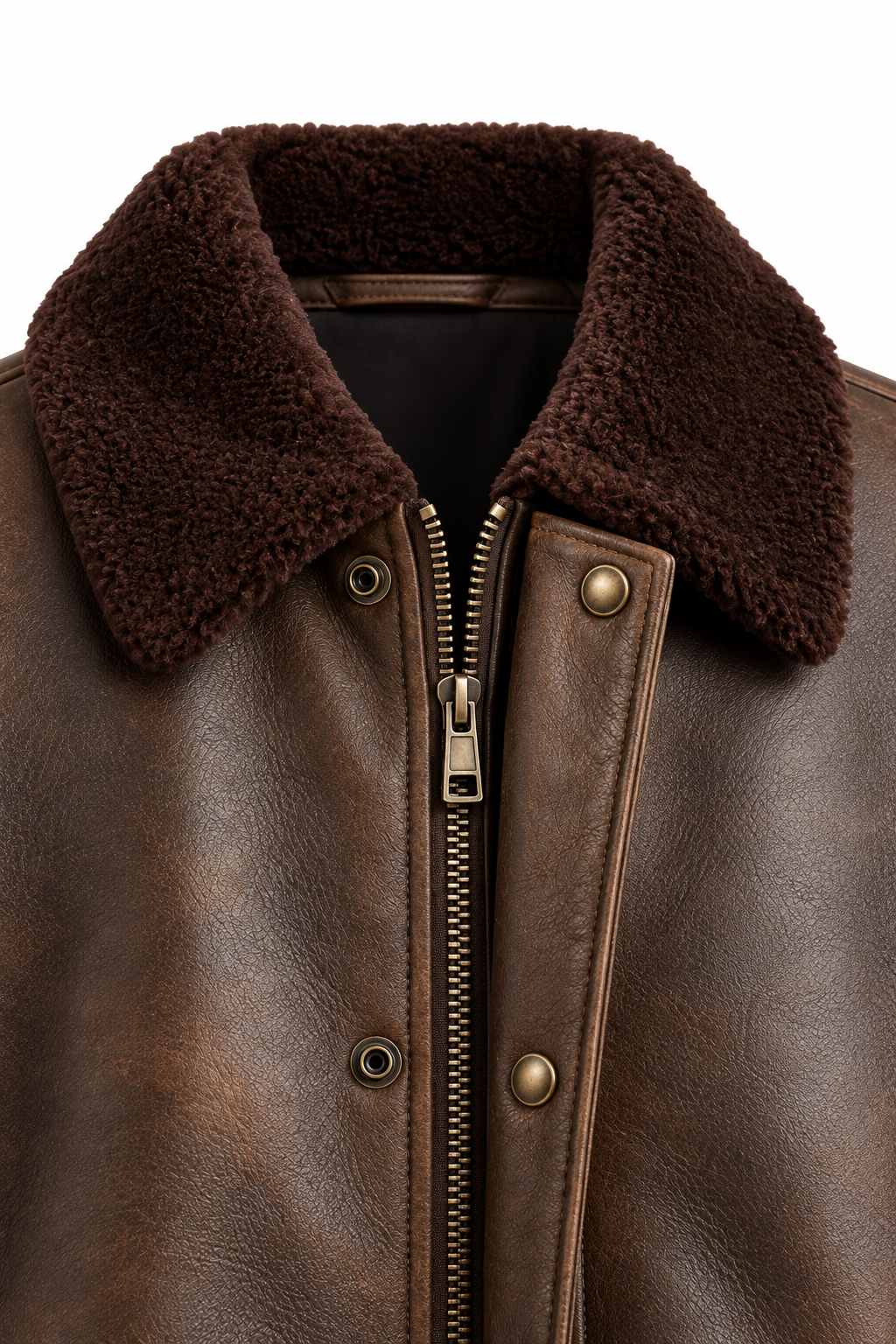 Close-up of plush shearling-style collar and zip on brown leather jacket