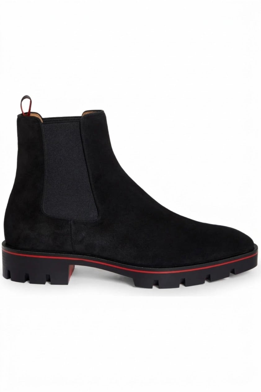Men's black suede Chelsea boot with red lug sole, side view